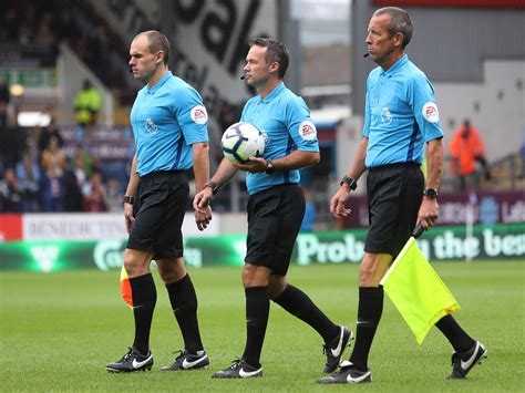 official soccer|soccer game officials.